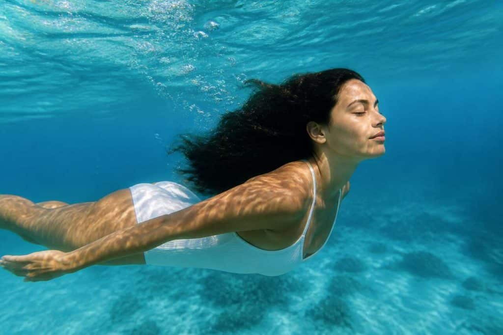 Trouver la sensation de glisse : les bienfaits psycho-corporels de la fluidité dans l'eau